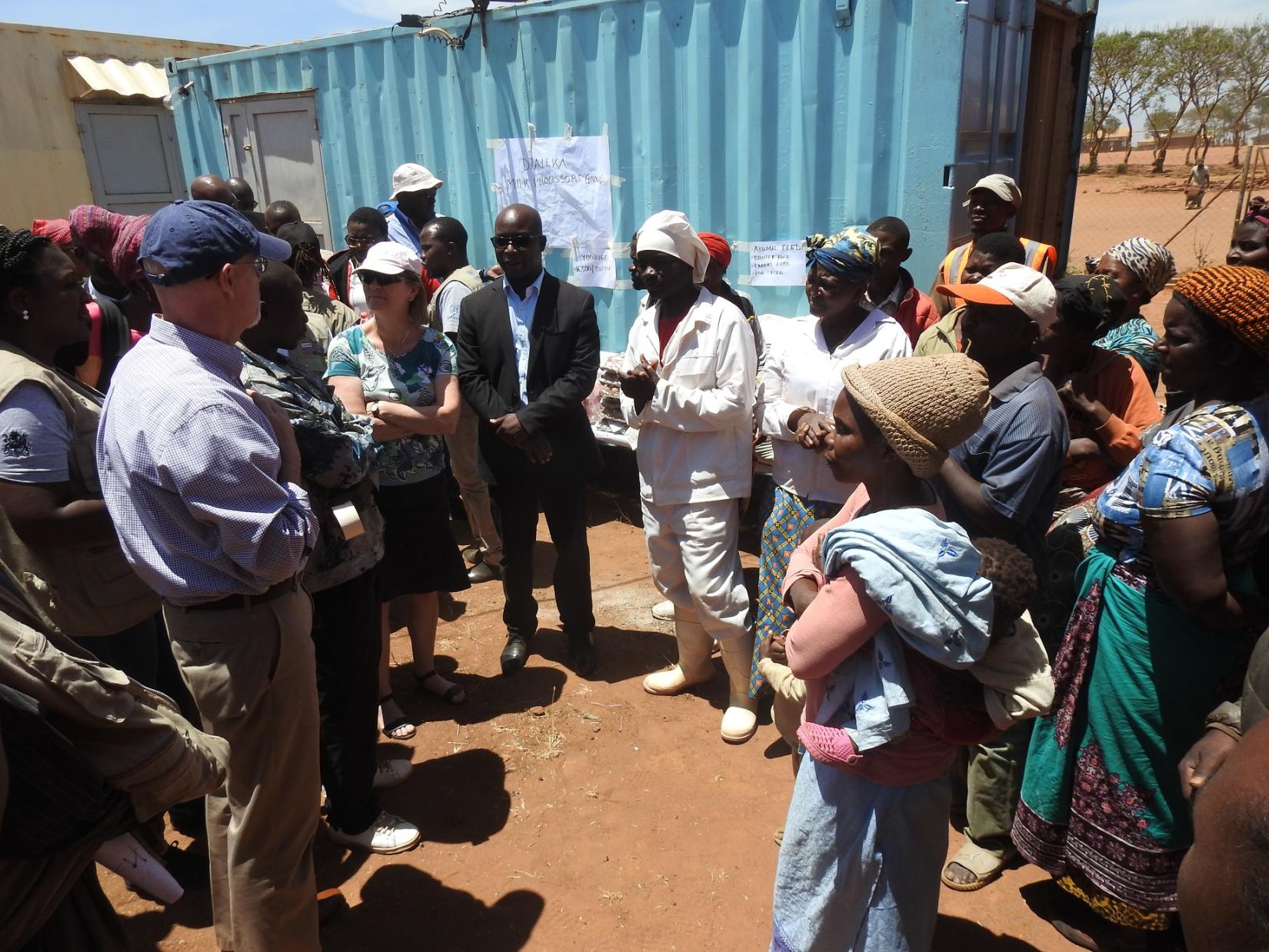 Ambassador Scott interacting with beneficiaries of a livelihood project by UNHCR and implemented through a partner CARD in Dzaleka camp.