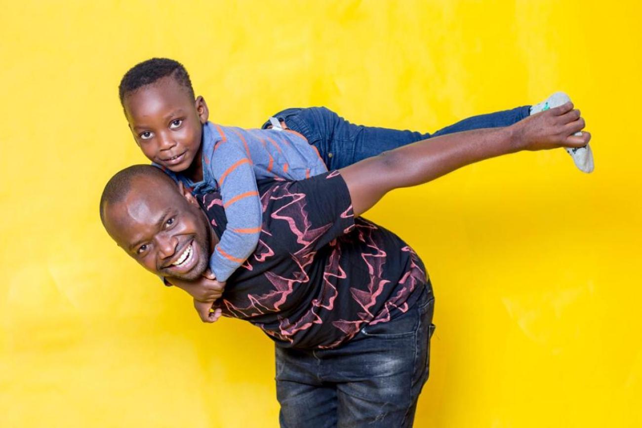 Children need their fathers' time and affection, says Victor, pictured with his five-year-old son Brian