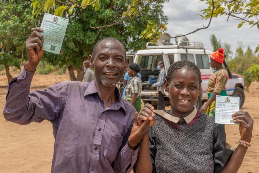 Happy people, finally vaccinated as the COVID-19 express vaccination van makes its way across the country